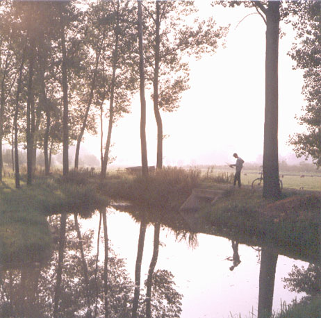 Landschap met sloot en jongen
