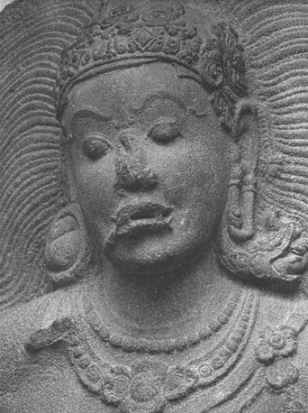 Zittende godin (?), een van de zeven moeders (?), detail: gezicht