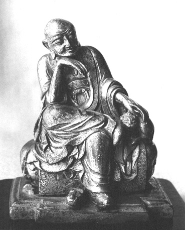 Zittend figuur