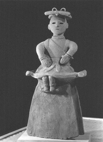Zittende miko (graffiguurtje)