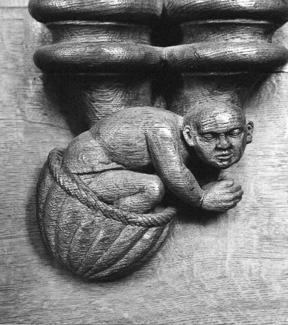 Koorgestoelte, misericorde: (biddende) man in mand