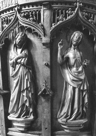 Doopvont, steunend op drie knielende engelen; en reliëf: voorstellingen van Christus, Maria, heilige Dorothea en negen apostelen; detail: Christus en Maria (?)