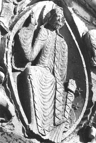 Timpaan, 'Majestas Domini': Christus zittend in een mandorla, omgeven door de symbolen van de vier evangelisten, Christus maakt een zegenend gebaar met zijn rechterhand