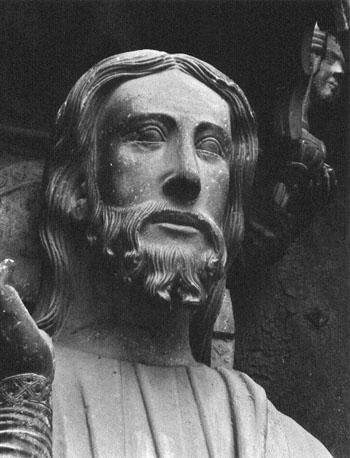 Zuider transept, facade, middenportaal, middenpijler: Christus als leraar, detail: hoofd van Christus