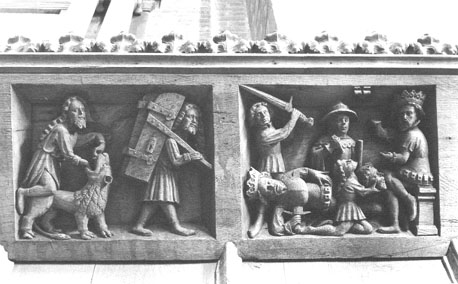 Koor, scènes bovenaan koorgestoelte: Samson doodt met blote handen een leeuw, Samson neemt de deuren van de stadspoort; koning Saul doodt zichzelf met een zwaard, Saul's hoofd naar David gebracht