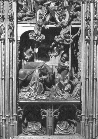 Retabel van Saluzzo (of: Saluces), detail middendeel: aanbidding van het Christuskind door Maria en Jozef; op de achtergrond: herders; in de twee nissen beneden: profeet Jesaja en sybille van Cumae