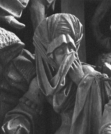 Passieretabel, kruisiging van Christus, detail: wenende vrouw onderaan het kruis