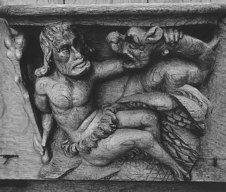 Koorgestoelte, detail: misericorde (man vechtend met monster)